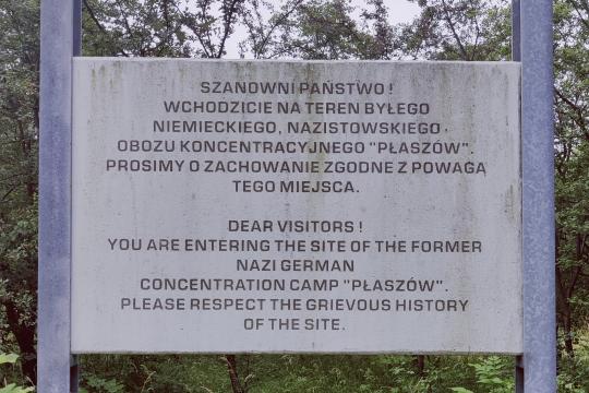 DEAR VISITORS!  YOU ARE ENTERING THE SITE OF THE FORMER NAZI GERMAN CONCENTRATION CAMP "PŁASZÓW". PLEASE RESPECT THE GRIEVOUS HISTORY OF THE SITE.